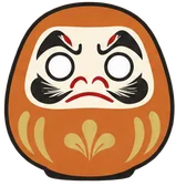 Orange Daruma doll at DARUMA LAB. — energy, business, challenge, action